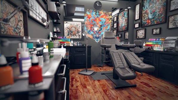 Tattoo studio interior with polished wood floors and warm light